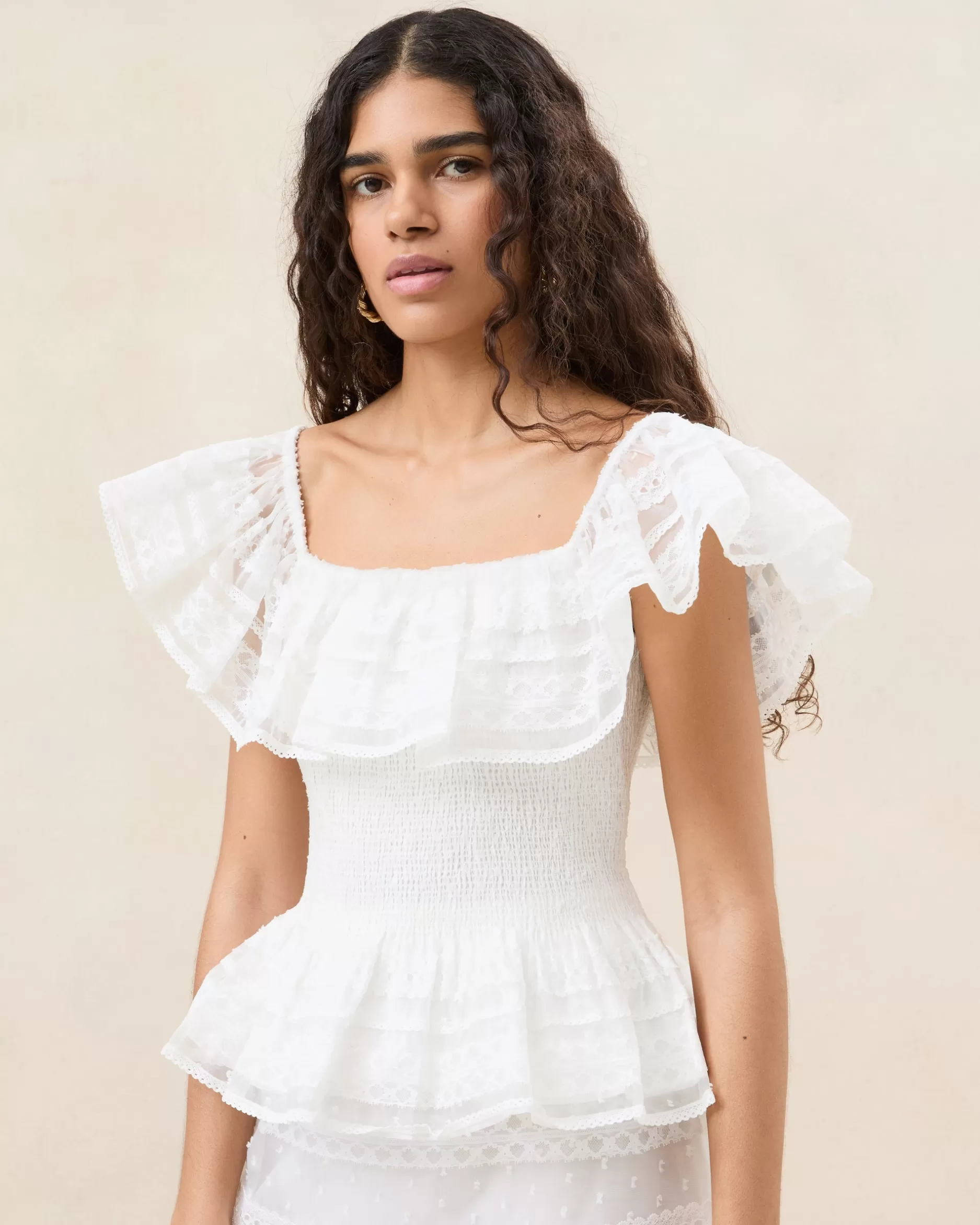 layla_cream_ruffle_sleeveless_blouse_2.webp Loeffler Randall Layla Cream Ruffle Sleeveless Blouse